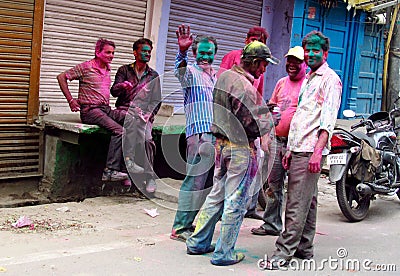 Hindu people celebrating the festival of colours Holi in India Editorial Stock Photo