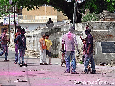 Hindu people celebrating the festival of colours Holi in India Editorial Stock Photo