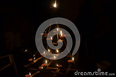 Hindu religion oil lamps or lanterns with a burning candle on Divali light festival Stock Photo