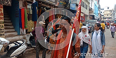 Hindu religious people walking on road for travel India Oct 2019 Editorial Stock Photo