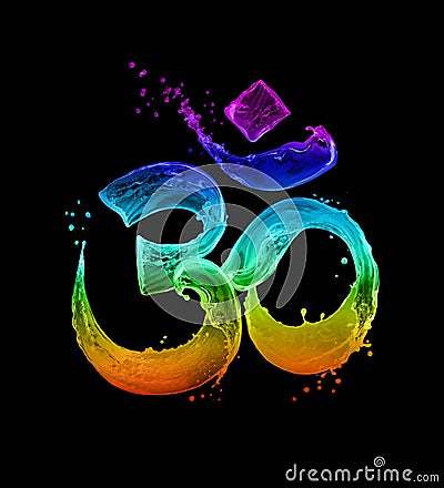 Hindu sign Om made of colored glowing water splashes on black background Stock Photo