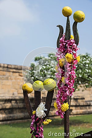 Hindu symbols, trishul normally found outside the temple, Gangaikonda Cholapuram, Tamil Nadu Stock Photo