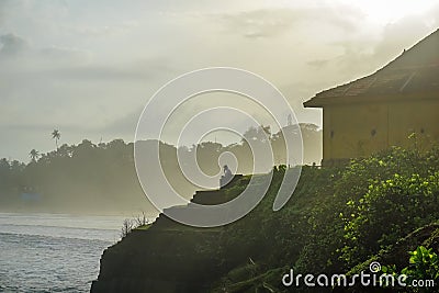 Hindu temple on a mountain against the backdrop of the sunset near the village Gokarna Stock Photo