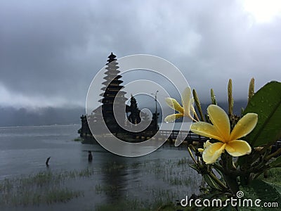 Hindu Temple, Pura Segara Ulun Danu Batur on Lake Batur on Rainy Cloudy Day in Bali, Indonesia. Stock Photo