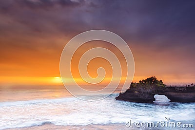 Hindu temple Pura Tanah Lot and sunset Bali, Indonesia. Stock Photo