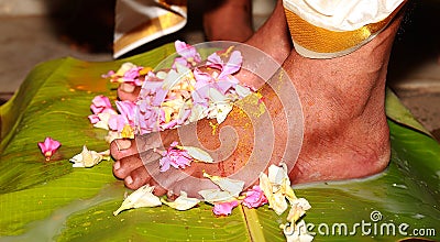 South Indian Hindu Wedding tradition, Bridal Legs with flowers ceremonial Stock Photo