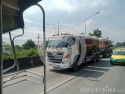 HINO VICTOR FM2P NGV WITH CEMENT BULK FULL TRAILER Editorial Stock Photo