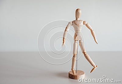 Hip internal rotation on wooden model, muscles in the medial and anterior parts of the hip Stock Photo