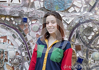 Hip seventeen yearold girl posing in the Magic Garden of Isaiah Zagar, Philadelphia Editorial Stock Photo