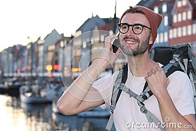 Hip tourist calling from Nyhavn, Copenhagen Denmark Stock Photo