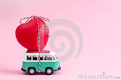 Riga, Latvia, January 22 2019. Hippie Bus with Red Heart on the Roof Valentines Day Miniature Small Car Banner Love Theme Editorial Stock Photo