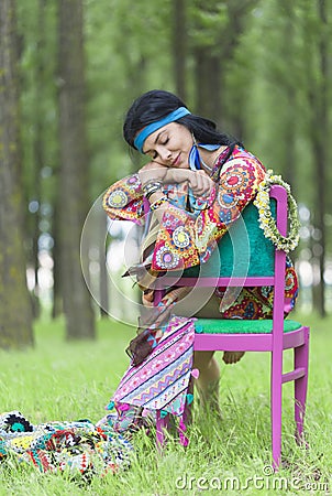 Hippie Girl Sleeping in a Forest Stock Photo