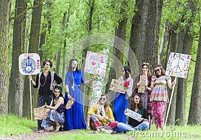 Hippie Girls with Inspirational Boards Editorial Stock Photo