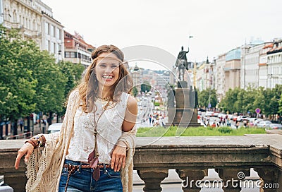 Hippy-looking woman tourist standing on Wenceslas Square, Prague Stock Photo
