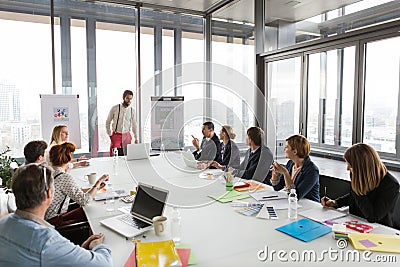 Hipster business man presenting the project Stock Photo