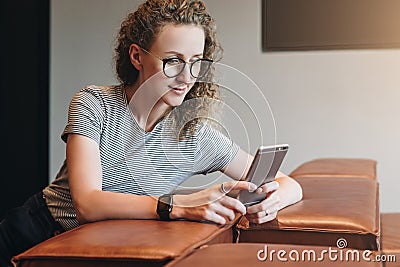 Hipster girl chatting,blogging,checking email.Student learning, studying.Online marketing,education,e-commerce,social Stock Photo