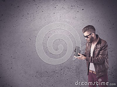 Hipster guy with vintage camera and beard Stock Photo