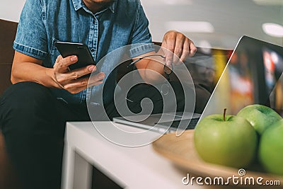 hipster hand using laptop compter and mobile payments online bus Stock Photo