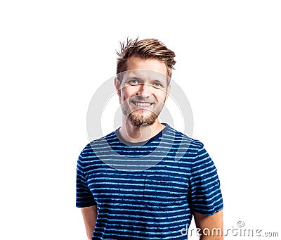 Hipster man in striped blue t-shirt, studio shot, isolated Stock Photo