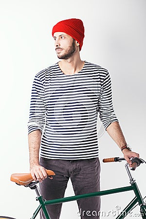 Hipster with retro bicycle Stock Photo