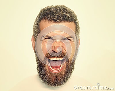 Hipster with scared face screaming. Feeling and emotions. Man with long beard and mustache. Stock Photo