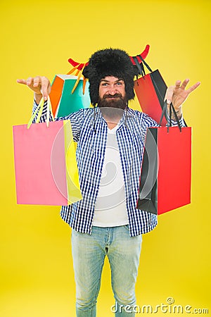 Hipster shopping addicted or shopaholic. Shopping concept. Guy shopping sales season discount. Animal and vet store Stock Photo