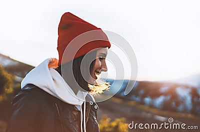 Hipster tourist smile and happy on background sun flare nature, young girl laugh enjoy journey landscape vacation trip, lifestyle Stock Photo