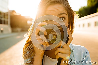 Hipster woman with retro film camera Stock Photo