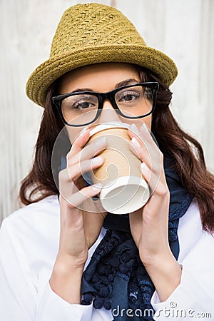 Hipster woman with take-away coffee Stock Photo