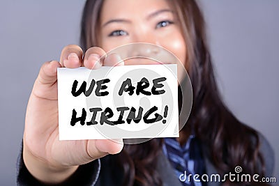 WE ARE HIRING! message on the card Stock Photo