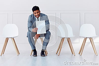 Hiring, recruitment and business man in a waiting room for a corporate company job interview. Happy, smile and confident Stock Photo