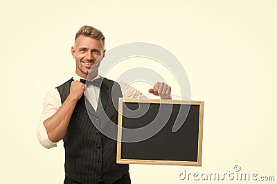 Hiring staff. Restaurant workers wanted. Cafe shop advertisement. Happy hours. Mature man waiter hold blackboard copy Stock Photo