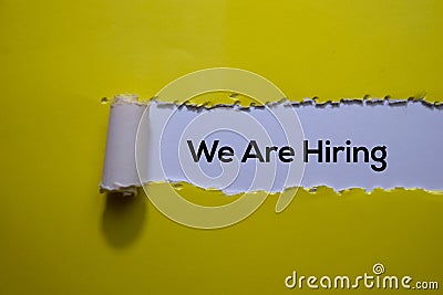 We Are Hiring Text written in torn paper Stock Photo