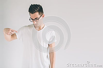 Hirt design and people concept - close up of young man in blank white tshirt front and rear isolated. Mock up template Stock Photo