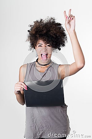 Hispanic brunette rebel model with afro like hair Stock Photo