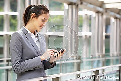 Hispanic Businesswoman Outside Office Stock Photo