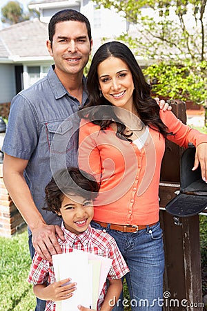 Hispanic Family Checking Mailbox Stock Photo