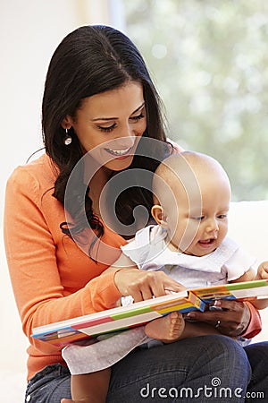 Hispanic mother and baby at home Stock Photo