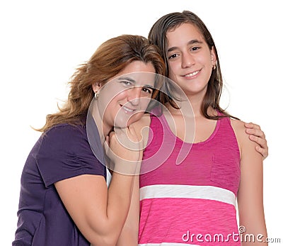 Hispanic mother hugs her teenage daughter isolated on white Stock Photo