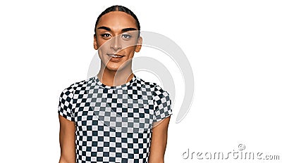 Hispanic transgender man wearing make up and long hair wearing modern clothes with a happy and cool smile on face Stock Photo