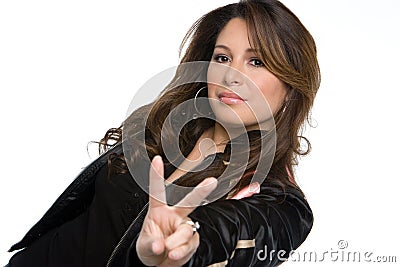 Hispanic woman making hand gesture isolated on white. Stock Photo