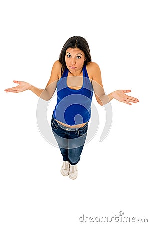 Hispanic woman shrinking shoulders open arms wondering confused in doubt Stock Photo