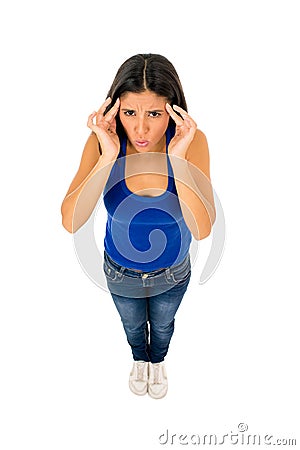 Hispanic woman touching tempo with fingers suffering headache migraine Stock Photo