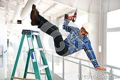 Hispanic Worker Falling from Ladder Stock Photo