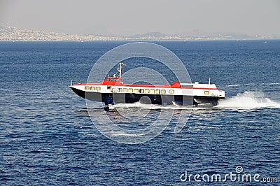 Hispeed dolphin boat Stock Photo