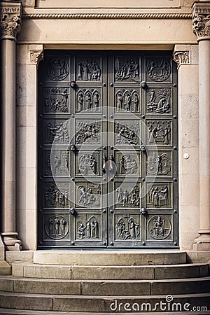 Historic Ancient Metal Door of Architecture Castle Church, Cathedral Exterior Decoration of Swiss Culture in Switzerland. Gate Stock Photo