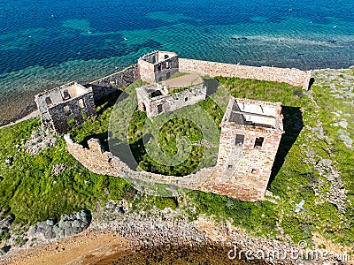 Historic ancient monastery on an island around the Patrica beach. (Turkish name kizlar manastiri) Cunda - Stock Photo