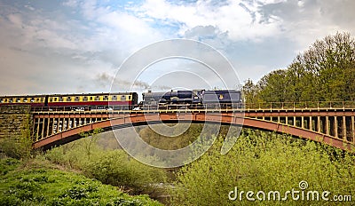 King George ii 2nd - The Blue King steam train going over the victoria Bridge Editorial Stock Photo