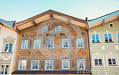 Historic brown house front with mural painting, old town Bad Tolz Stock Photo