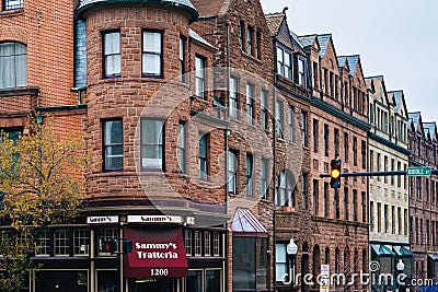 Historic buildings at the intersection of Charles Street and Biddle Street, in Mount Vernon, Baltimore, Maryland Editorial Stock Photo
